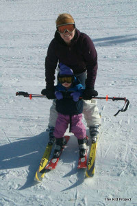 Teaching toddlers to ski- between the legs