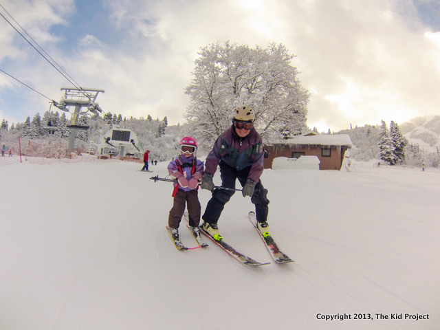 grandpa and toddler skiing at Snowbasin