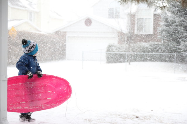 Sledding in snow storm