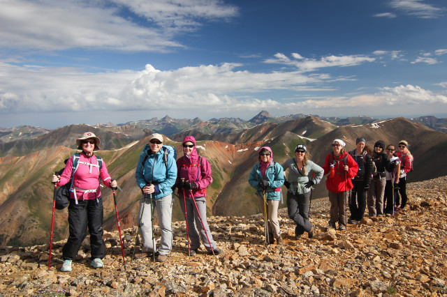 Women hiking up to Redcloud in Colorado